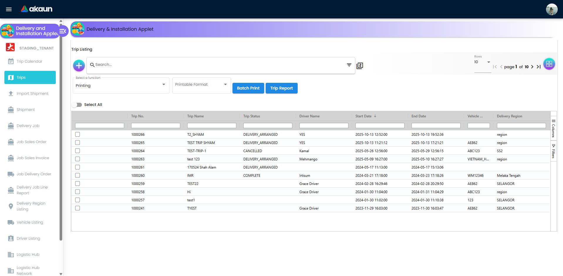 Trip listing screen with printing tools, trip status actions, and trip status date input